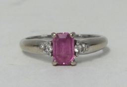 An 18ct white gold pink sapphire and diamond set ring, size J.