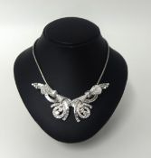 A fine and impressive Art Deco diamond set double clip necklace, width 11cm.
