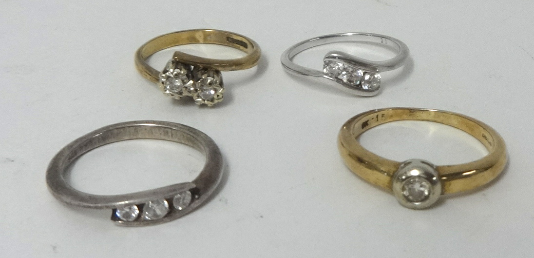 Four various dressing rings (two 9ct gold).