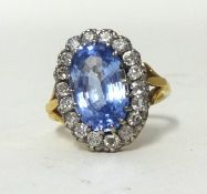 An 18ct antique sapphire and diamond set cluster ring, size M.