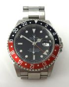 Rolex, a Gents GMT Master II stainless steel wrist watch, with original box , also a