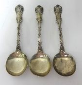 Three Sterling silver soup spoons.