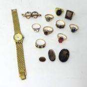 A Ladies yellow metal gold plate Sekonda watch, a selection of 9 mixed store rings in 9ct and one