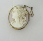 A cameo brooch, set in yellow metal mount, height 30mm.