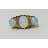 An 18ct 3 stone opal ring, size N.