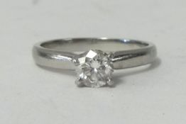 A platinum and diamond set solitaire ring, 0.54ct, VS2, brilliant cut stone, purchased new 2011.
