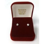 A pair of 18ct yellow and white gold claw set diamond ear studs, approx. .50ct