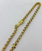 A Georgian style gold necklace set with a ruby, probably 18ct, approx. 27.90g.
