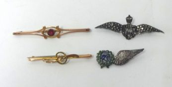 A 9ct gold brooch, RAF Sweetheart brooch, another wing brooch and a yellow metal brooch (4).