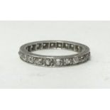 A platinum and diamond set full band eternity ring, size M, approx 3.50g.