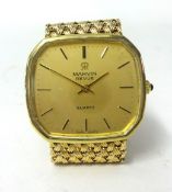 Gent’s 9ct yellow gold Marvin Revue quartz watch. Octagonal shaped champagne dial depicting baton