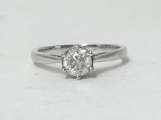 A white gold and diamond set solitaire ring,.50 carat, size N (with purchase receipt at £1,399) .