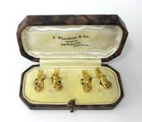 A pair of yellow gold cufflinks in the shape of Pistols, stamped .750, cased 7.9g.
