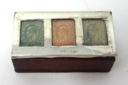 An Edwardian silver stamp box, 8cm wide.