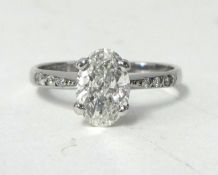Single stone diamond ring. Comprising oval-cut diamond, approximately 1.00ct. Colour G-H. Clarity