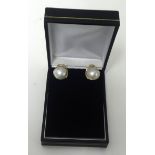 A pair of large 9K pearl and diamond earrings set in yellow gold.