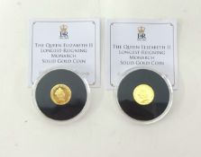 Two gold 1/4 sovereign coins with certificates.