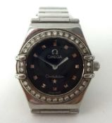 Omega, a Ladies steel and diamond set Constellation wrist watch, with original box.