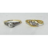 An 18ct diamond set solitaire ring and another (2)