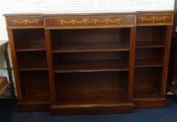 A mahogany and inlaid break front dwarf bookcase, approx 155cm long.