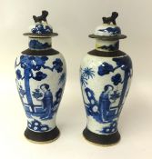 Pair of Chinese crackle glaze vases and covers, height 38cm