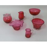 Collection of cranberry glass, tallest 13cm