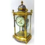 A French gilt and champlevé four glass clock the movement signed by A.D. Mougin, with compensated