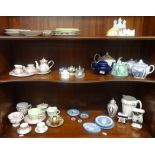 Various ornaments and figures including Nao, porcelain cups and saucers, miniature modern service