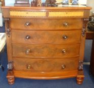 A mahogany bow fronted chest of drawers, the top frieze drawers veneered in birds eye maple and