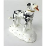 Early Staffordshire porcelain dog, 8cm.