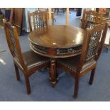 A dark wood table and four chairs, width 99cm, height 75cm.