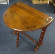 Edwardian Sutherland walnut tea table with faux bamboo legs