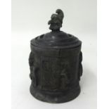 Lead Punch tobacco jar and cover, height 17cm.