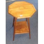 A mahogany and inlaid occasional table with lower tier.