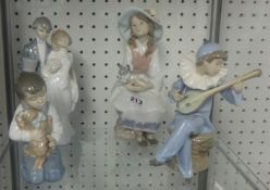 Two Lladro figures and two Nao figures (4)