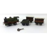 Hornby O Gauge loco and tender, G.N.R. and two wagons and key, tinplate and clockwork