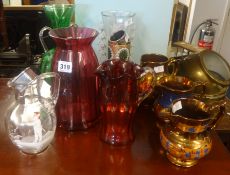 Three 19th century copper lustre jugs, 'Mary Gregory' style glassware, cranberry glass etc.