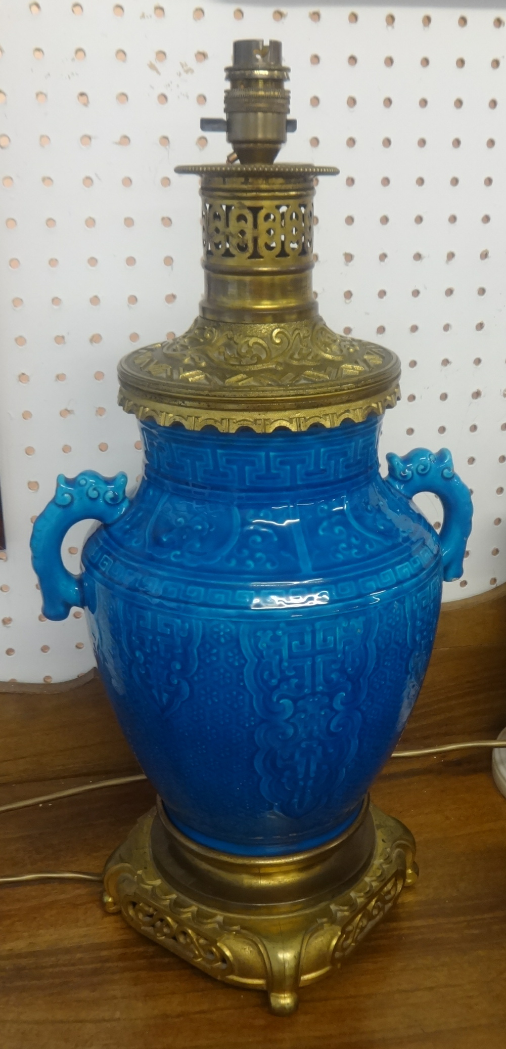 A 20th century Chinese pottery an gilt brass table lamp, height 46cm.