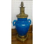 A 20th century Chinese pottery an gilt brass table lamp, height 46cm.