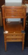 Two mahogany bedside tables fitted with drawers.