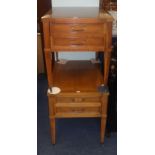 Two mahogany bedside tables fitted with drawers.
