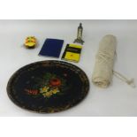 A canvas flag roll, M1 Ken novelty clock, ivory and brass thermometer, two navigation books and a