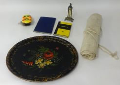 A canvas flag roll, M1 Ken novelty clock, ivory and brass thermometer, two navigation books and a