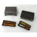 Silver cigarette box, pewter box and two cased amber cheroot holders