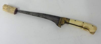 An antique afghan dagger with ivory grip.