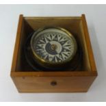 A early 20th century dry card compass, boxed.