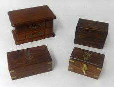 A collection of decorative wood boxes including jewellery boxes, display cabinet, and a pair of