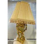 A green marble and ormolu table lamp, height 46cm.