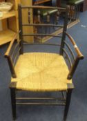 Victorian bar back elbow chair with rush seat