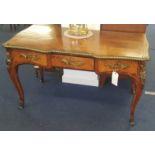 A French three drawer writing table with ormolu decoration, width 123cm, depth 62cm.